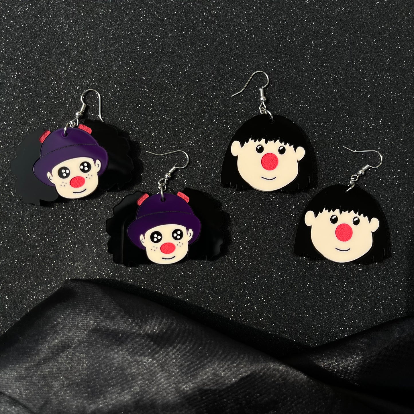 a clown and her dolly